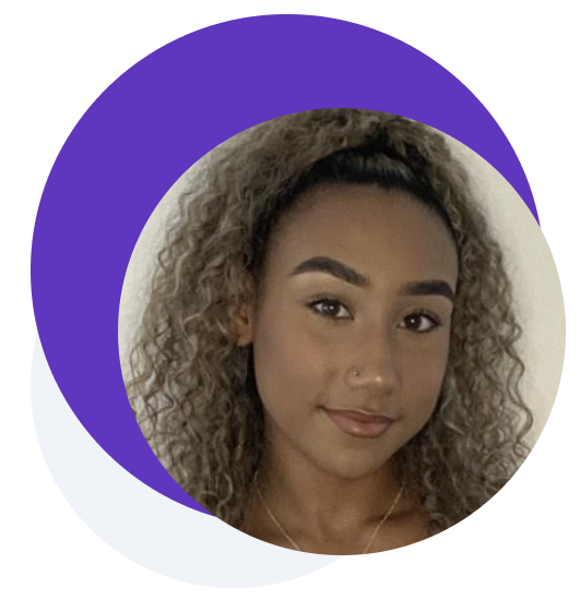 Picture of a woman with a slight smile and curly hair